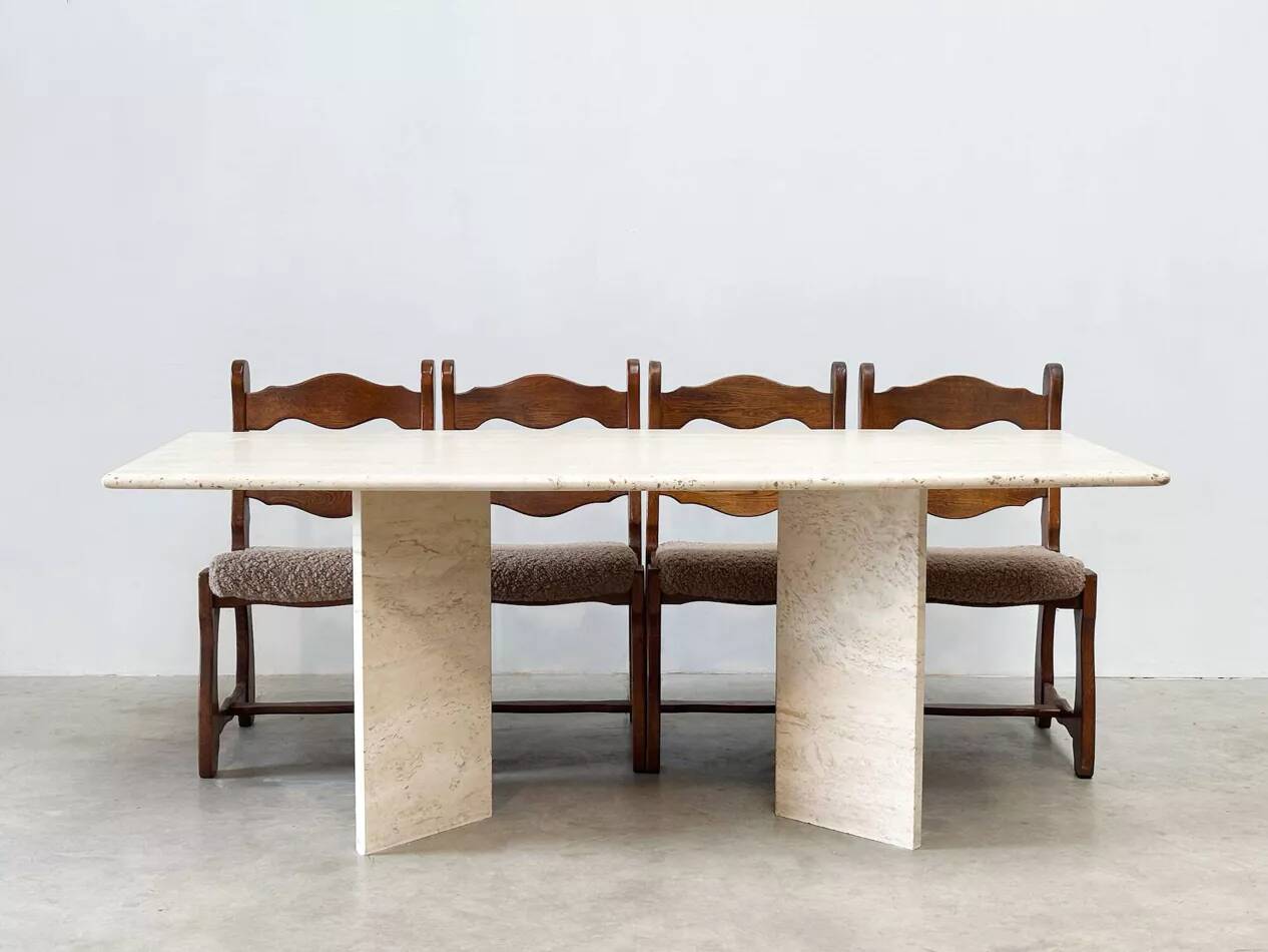 Sculptural travertine dining table