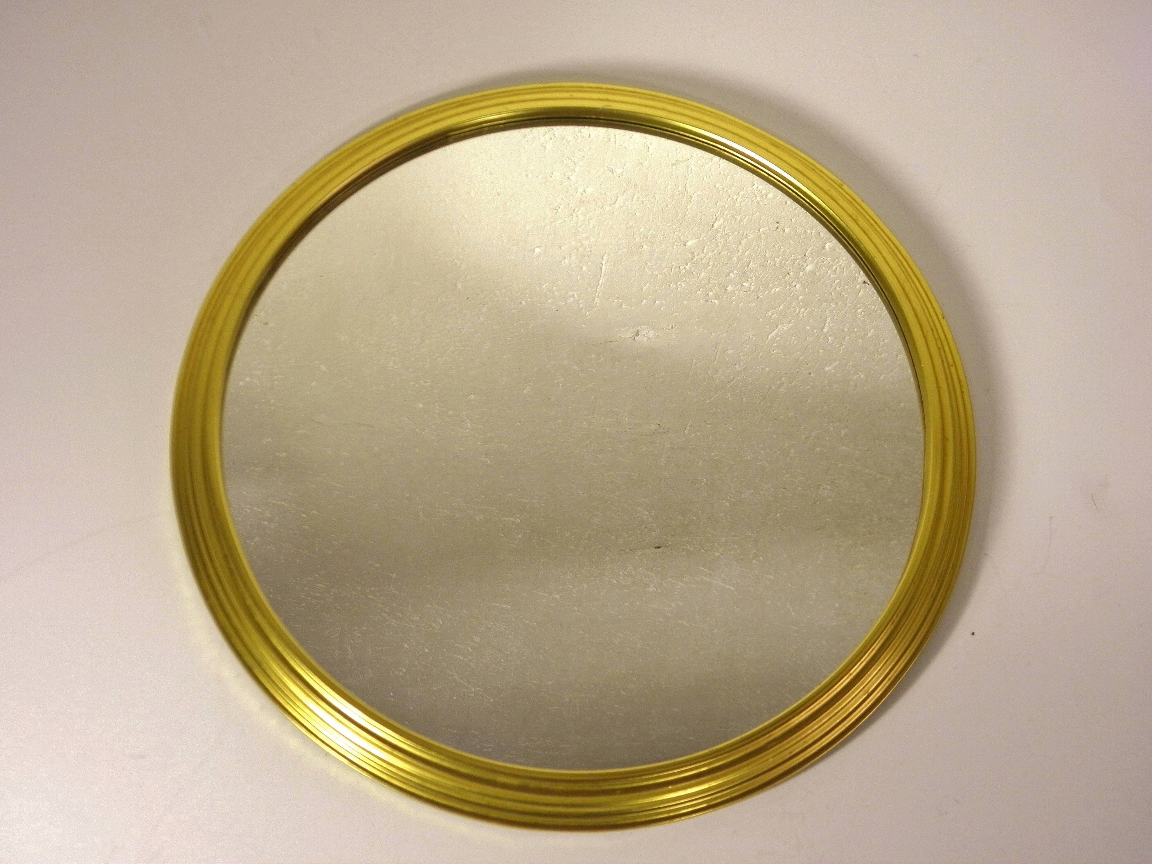 Round mirror with gold frame 31 cm