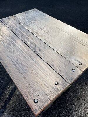 Old table with patinated green legs