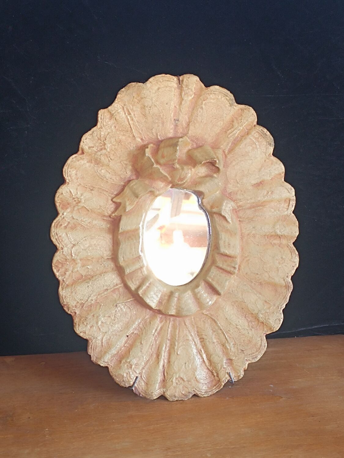 Painted oval plaster mirror