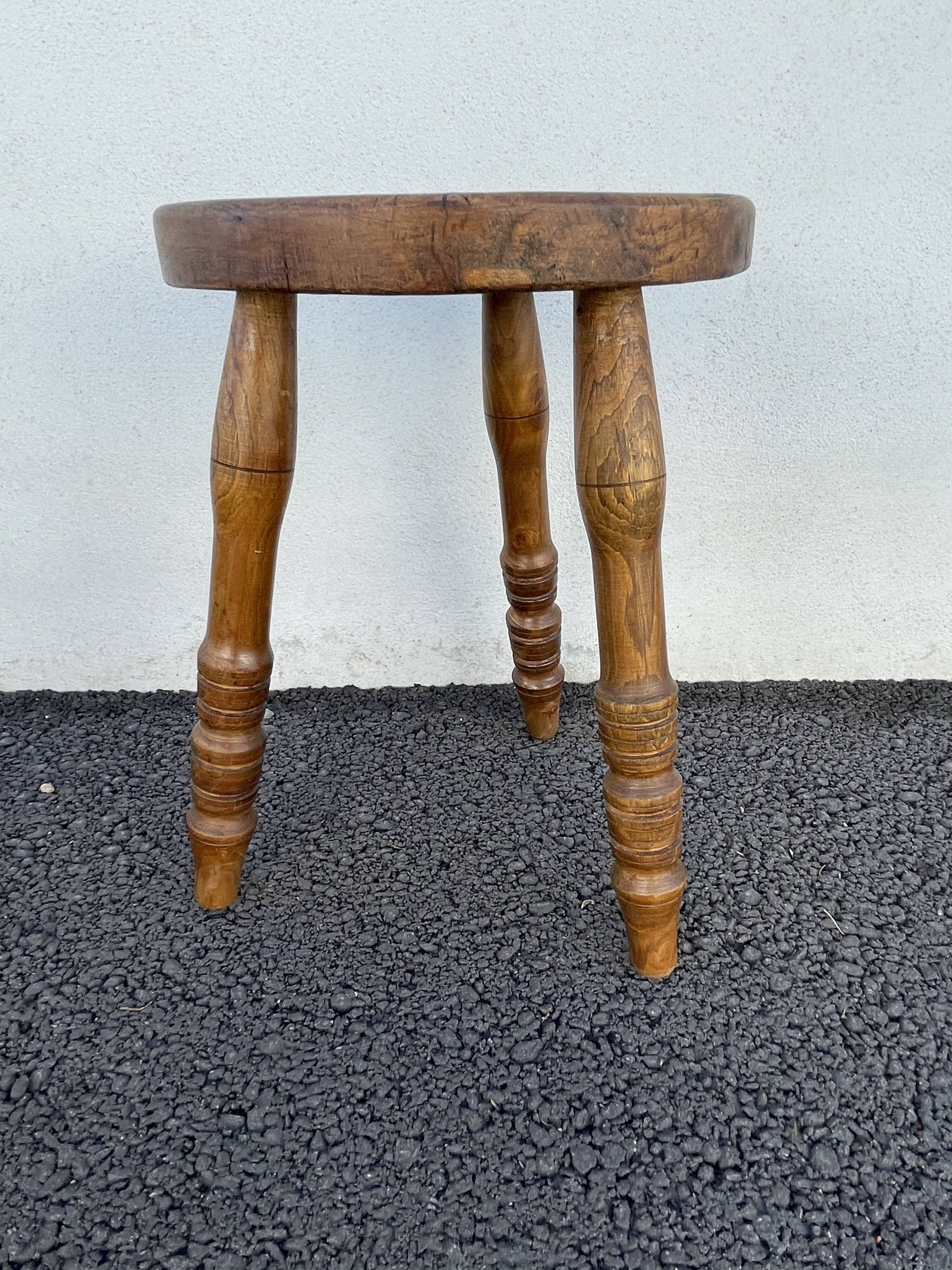 Wooden tripod stool