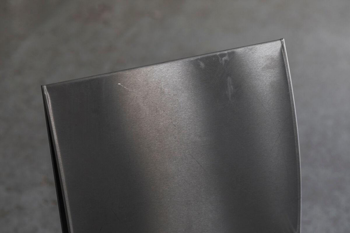 Set of 6 dining chairs in bent aluminum, 1980’s