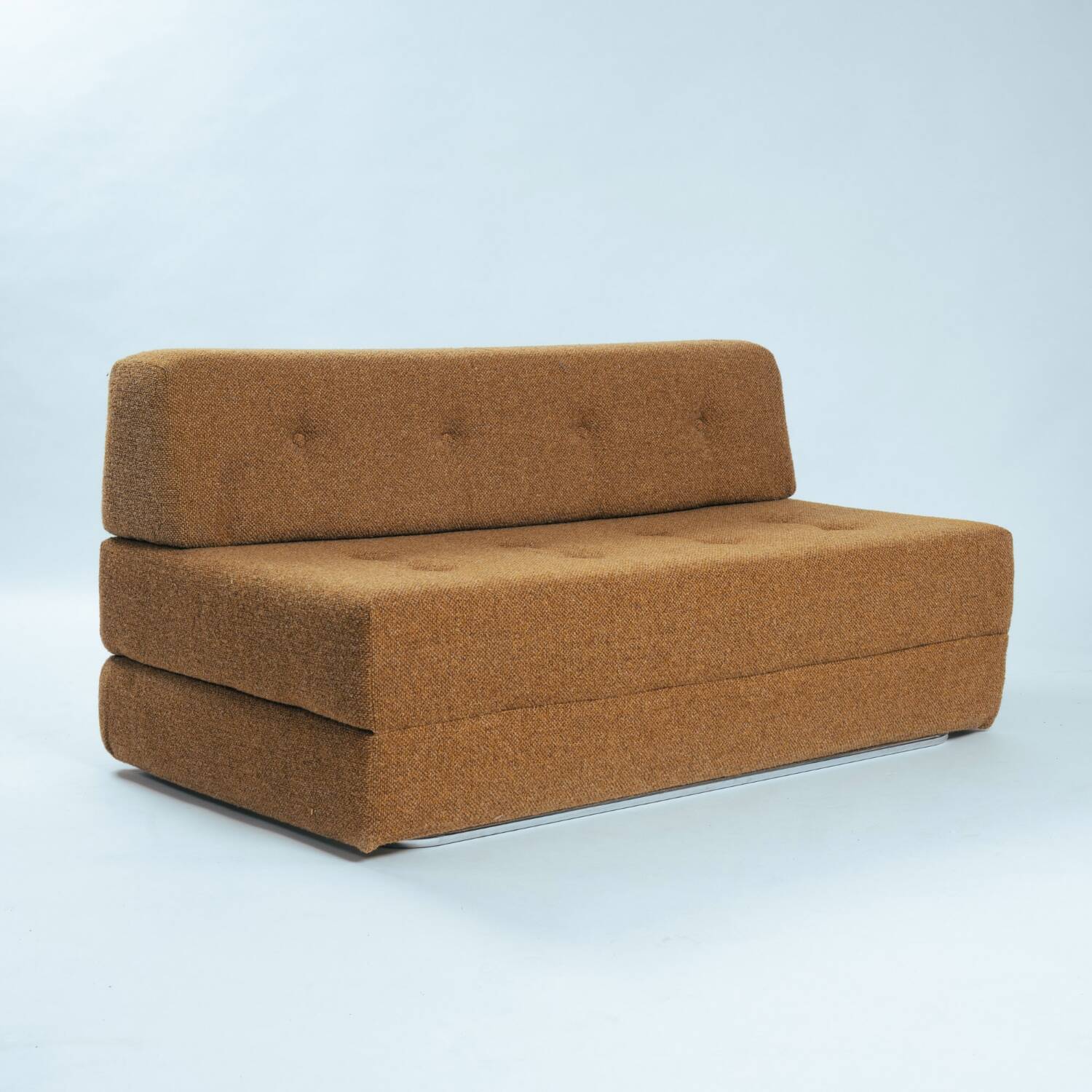 Bauhaus style tubular sleeping sofa in yellow ocre wool