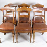 Set of eight late empire chairs in high quality brown leather in mahogany