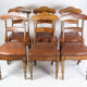 Set of eight late empire chairs in high quality brown leather in mahogany