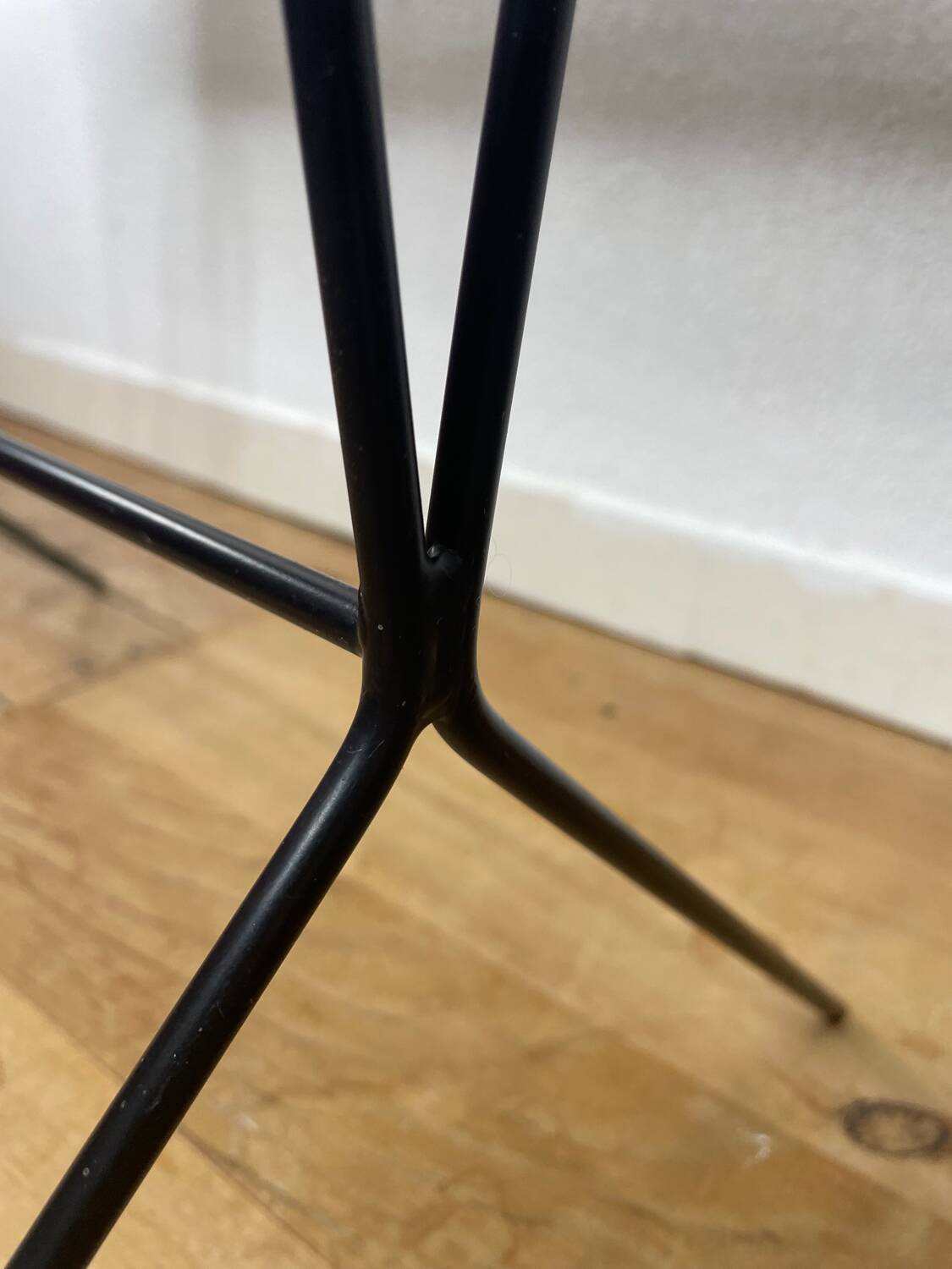 1950s black perforated metal planter in the style of Mathieu MATEGOT