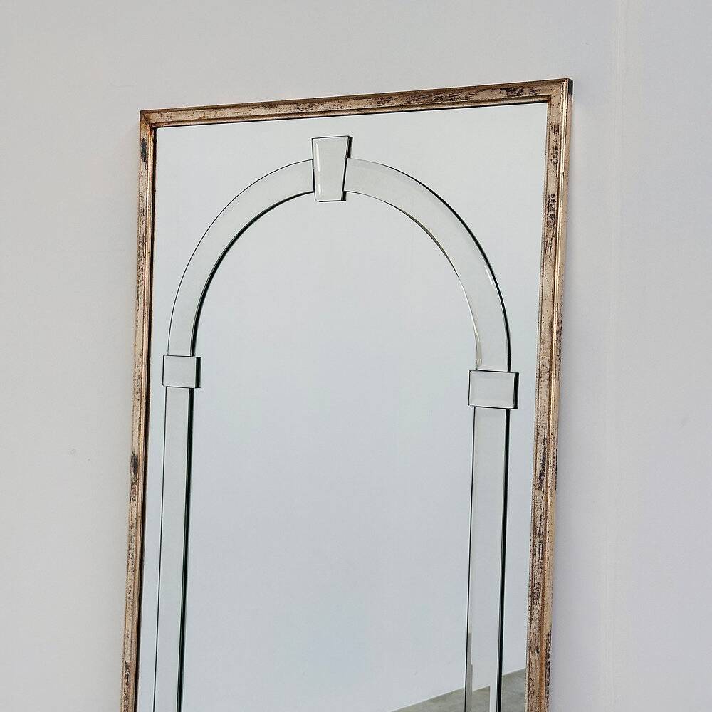 Large Art Deco style beveled wall mirror with architectural arch design