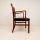 Mid-century armchair by Ole Wanscher for Fritz Hansen, stained beech and leather.