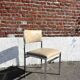 Set of 4 vintage chairs in chrome and faux leather.