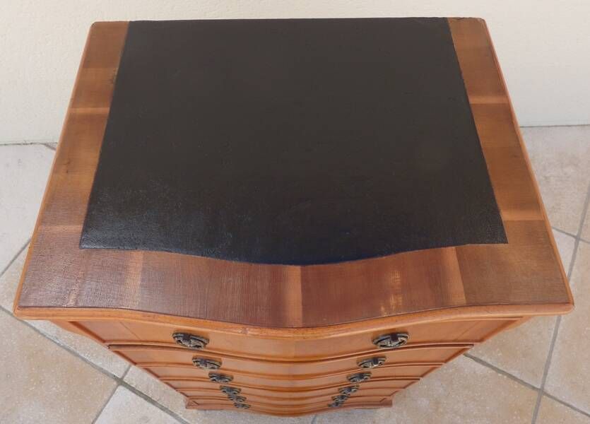 Louis XVI style chest of drawers in wood and cherry veneer.