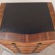 Louis XVI style chest of drawers in wood and cherry veneer.