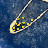 Large decorative dish signed André Baud, diameter 37 cm, enamelled decoration on a deep blue background
