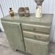 Compass leg sideboard