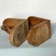 Old wooden bookends with painted characters