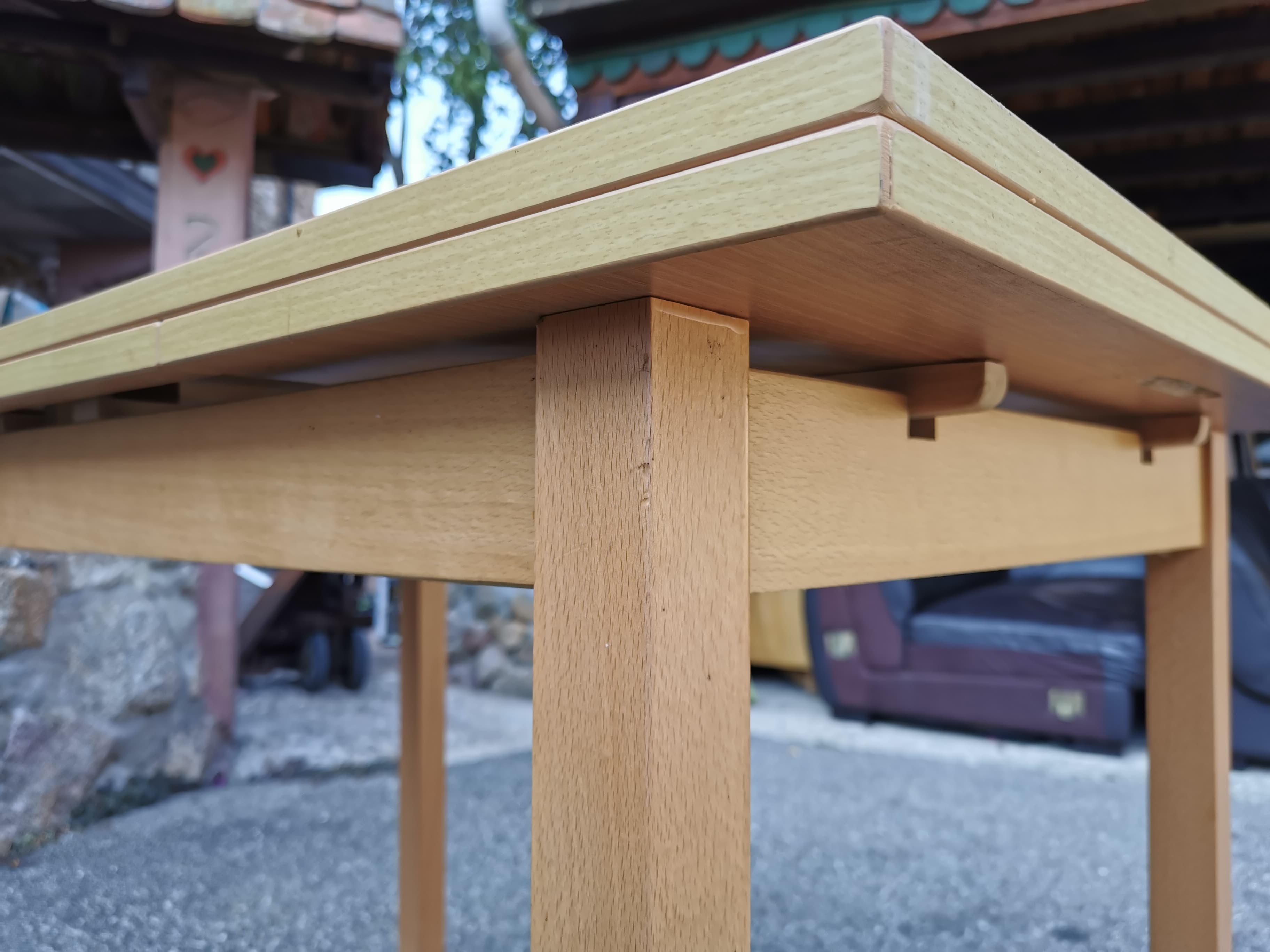 Beech table with extension cords