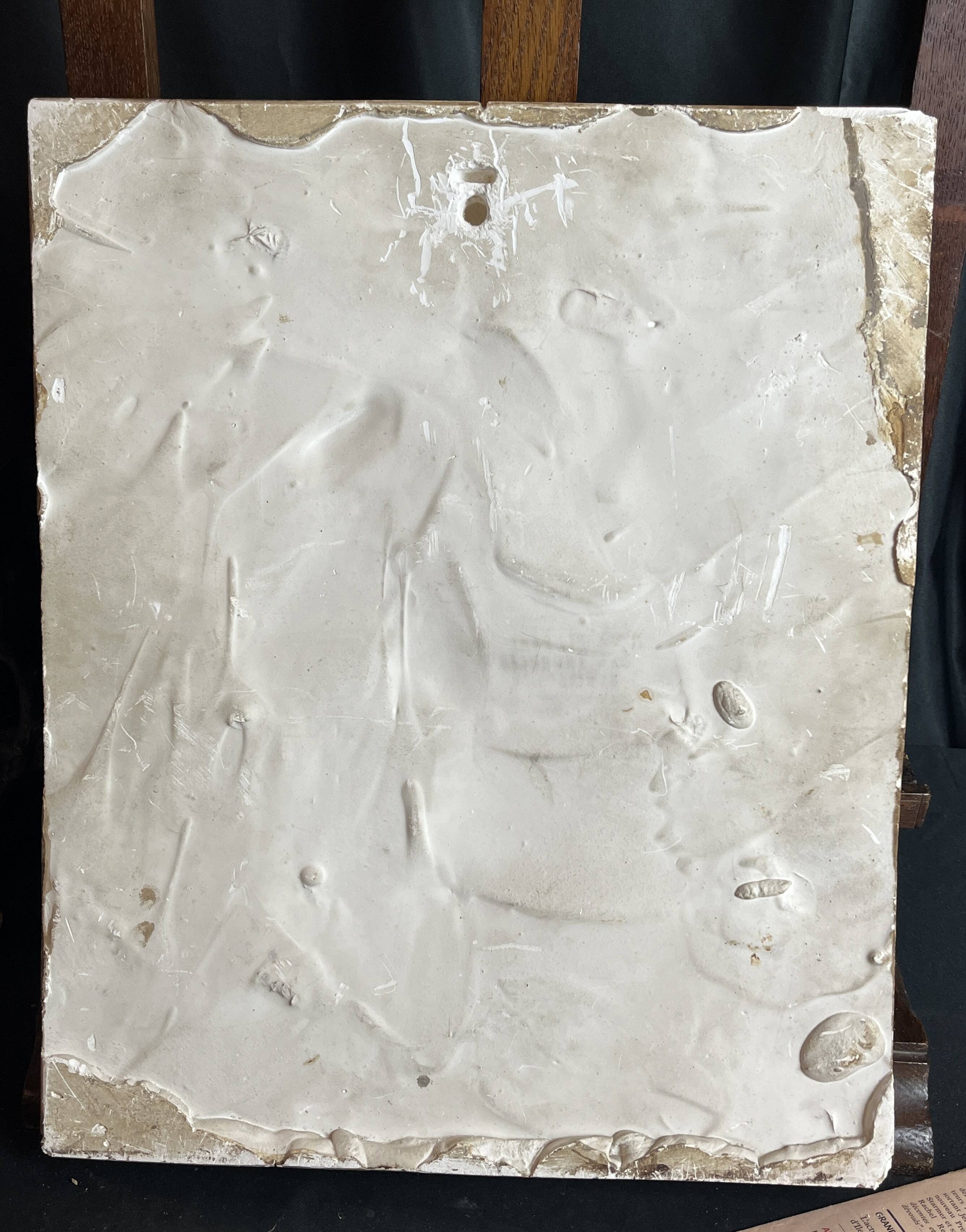 Patinated plaster bas-relief signed Robert Coutin, early 20th century.