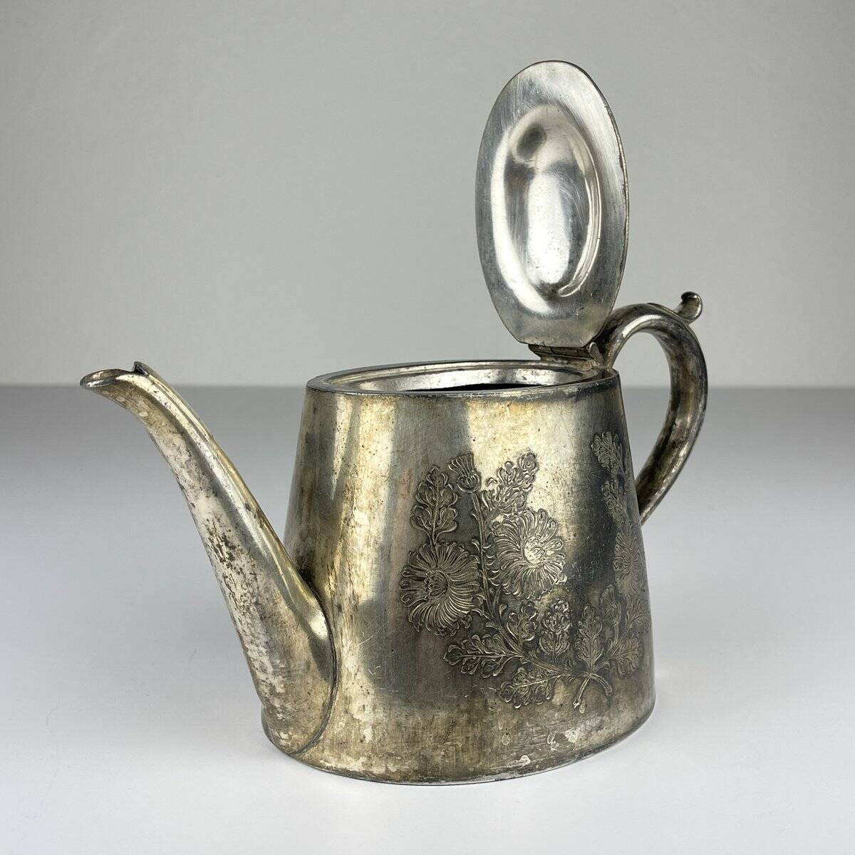 Antique silver-plated teapot from Sheffield, England, 1890-1910.
