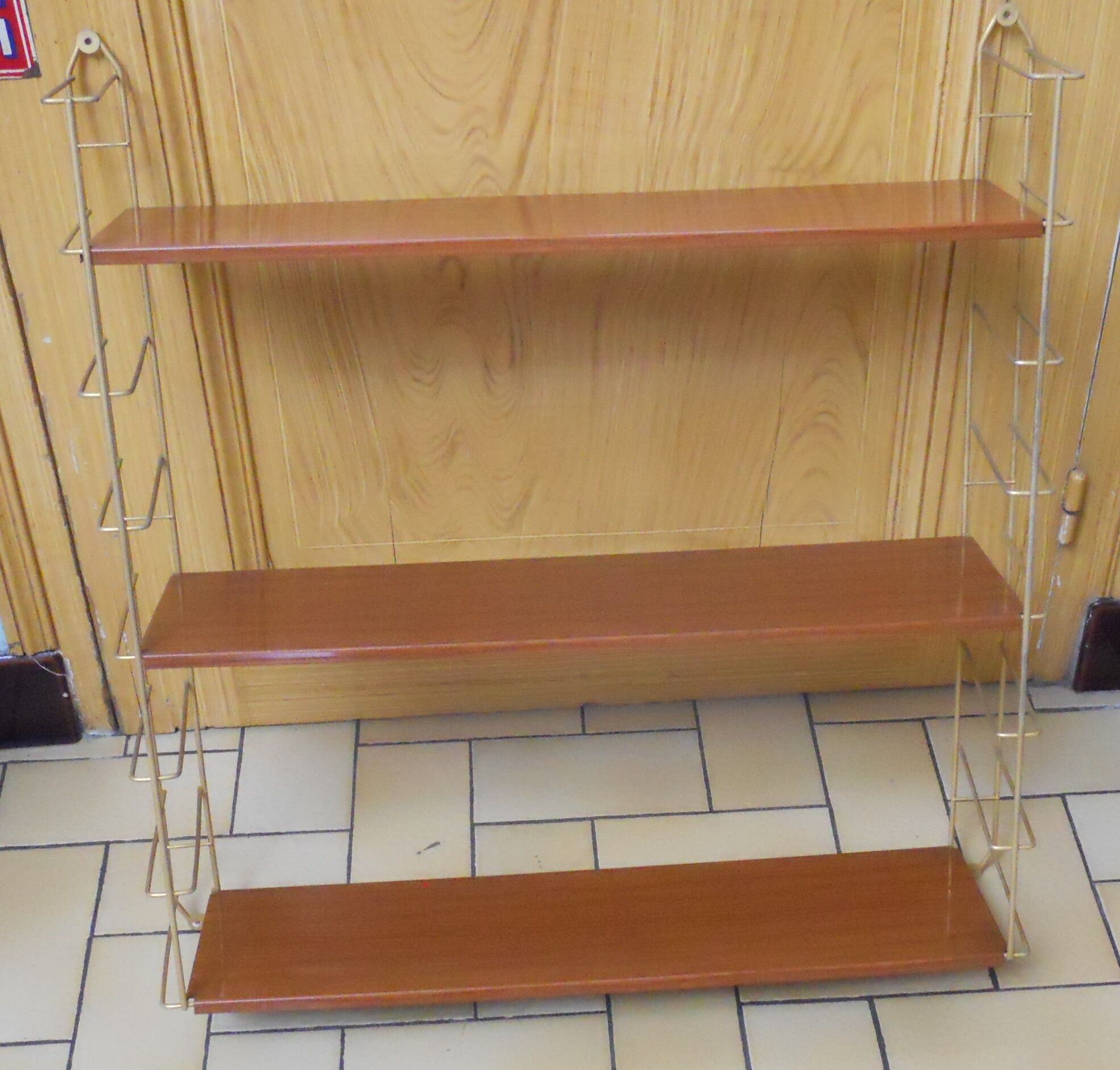 Wall mounted vintage metal shelf