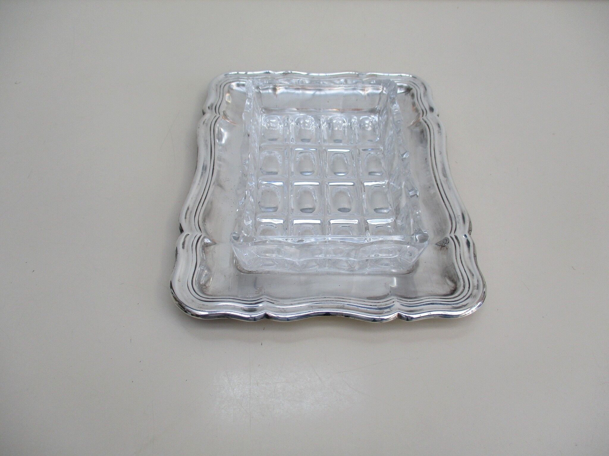 Butter silver metal and glass