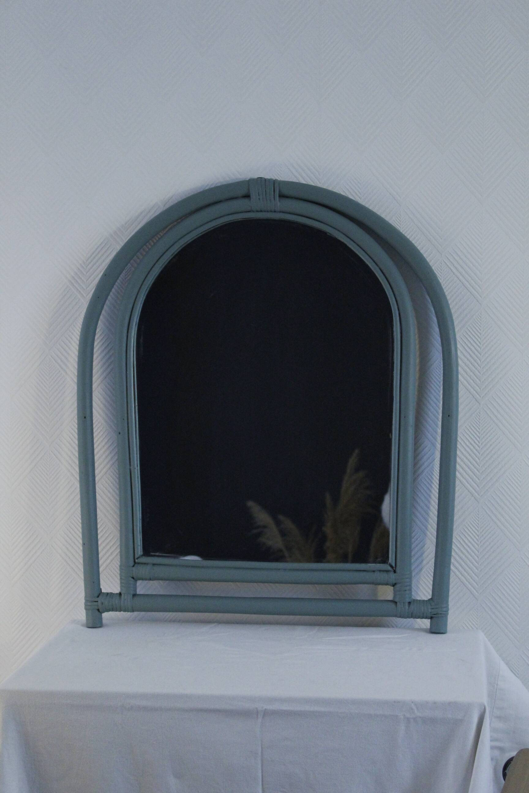 Sage green painted rattan mirror