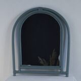 Sage green painted rattan mirror