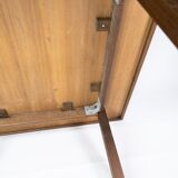 Coffee table in dark oak of danish design from the 1960s.