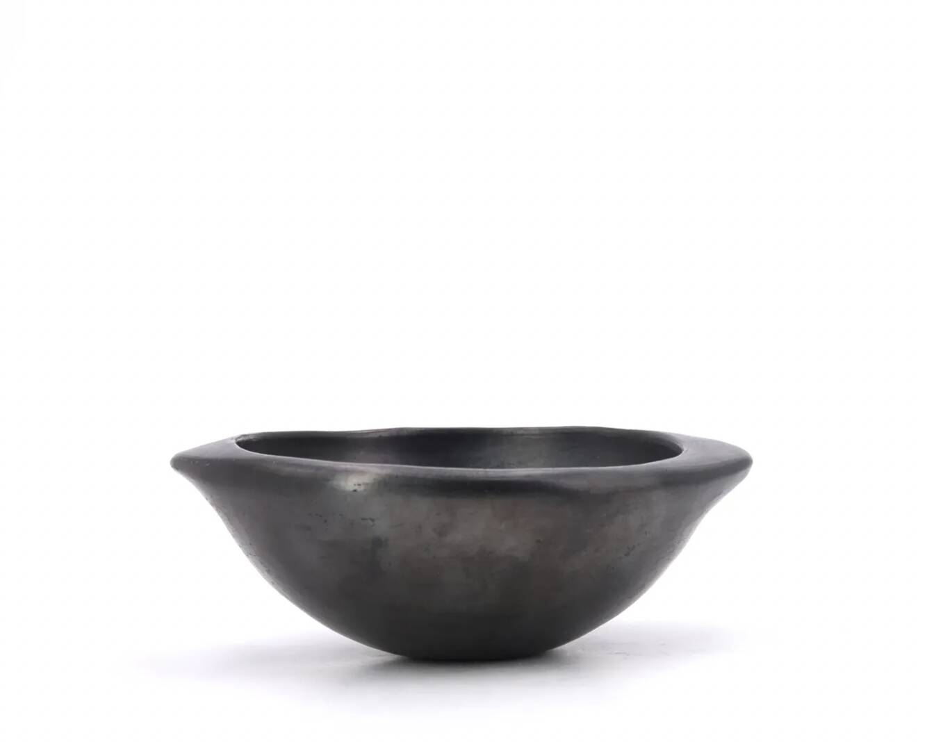 Colombian wobbly bowl in black ceramic, 1970s.