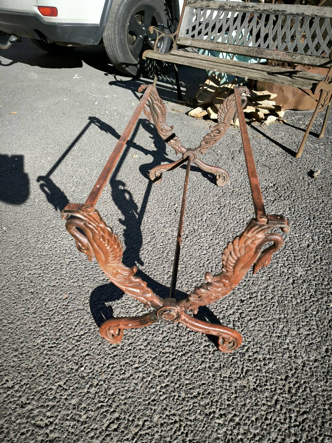 Cast iron and marble swan-neck coffee table