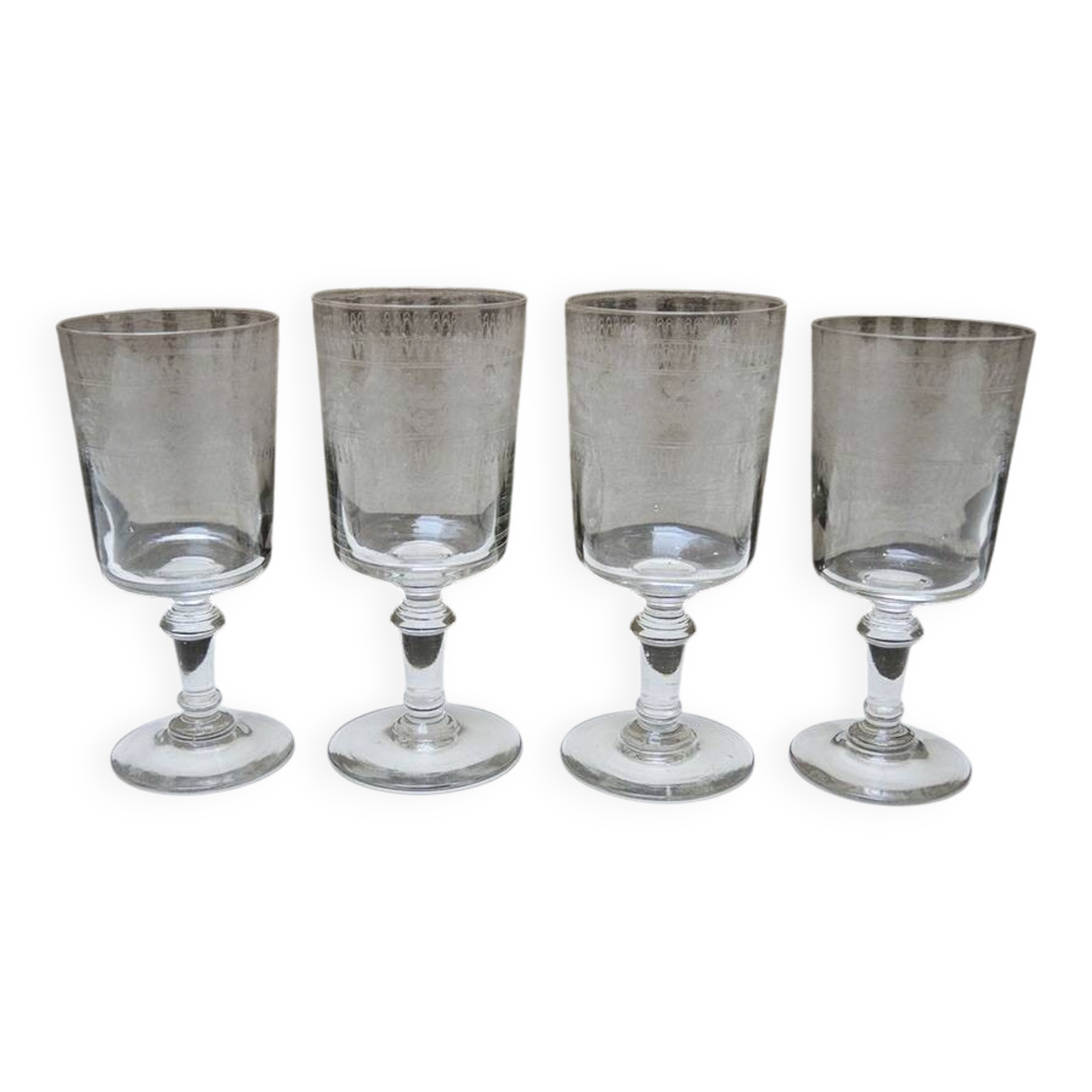 4 engraved transparent stemmed glasses by Baccarat