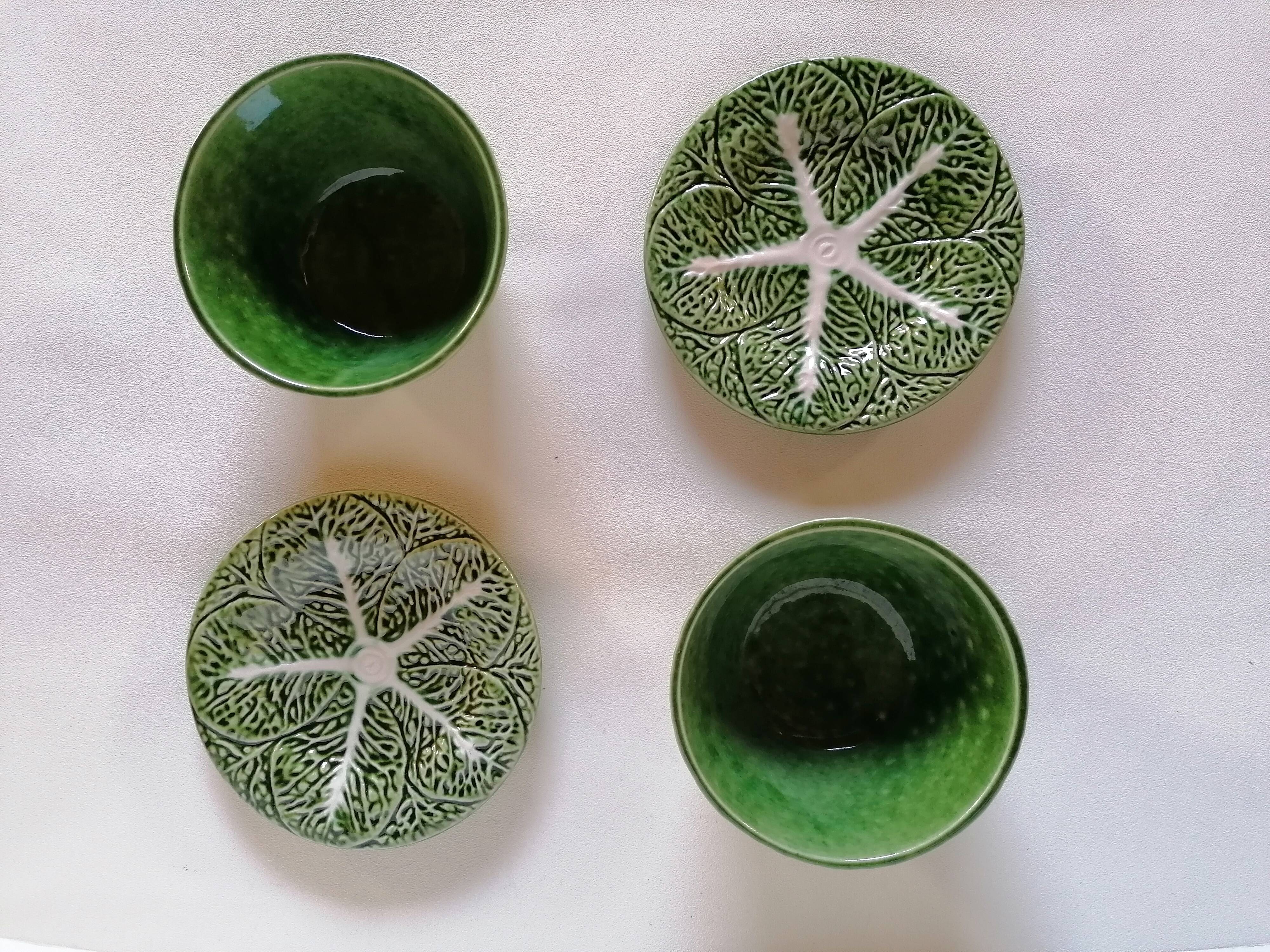 Lot bowls and plates in dabbling cabbage leaves