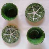 Lot bowls and plates in dabbling cabbage leaves