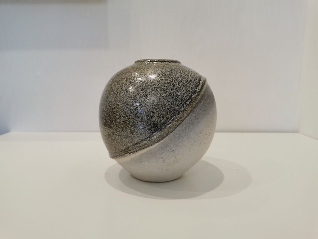 Grey potter's ball vase