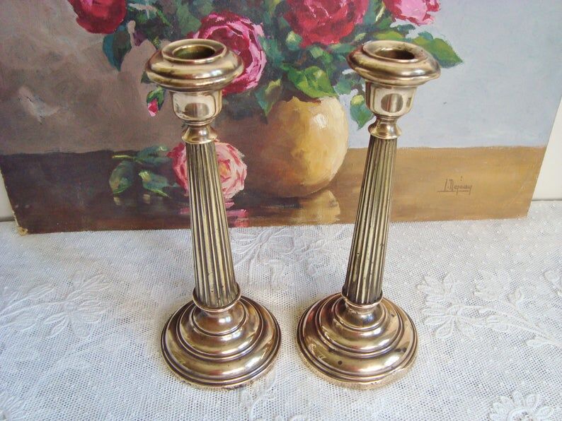 Pair of very old brass candlesticks