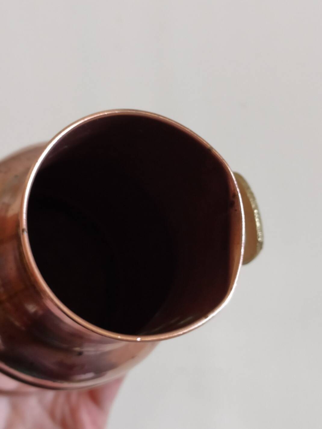 Small copper milk jug