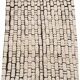 Large cream and black checked Berber rug, 280 × 200 cm.