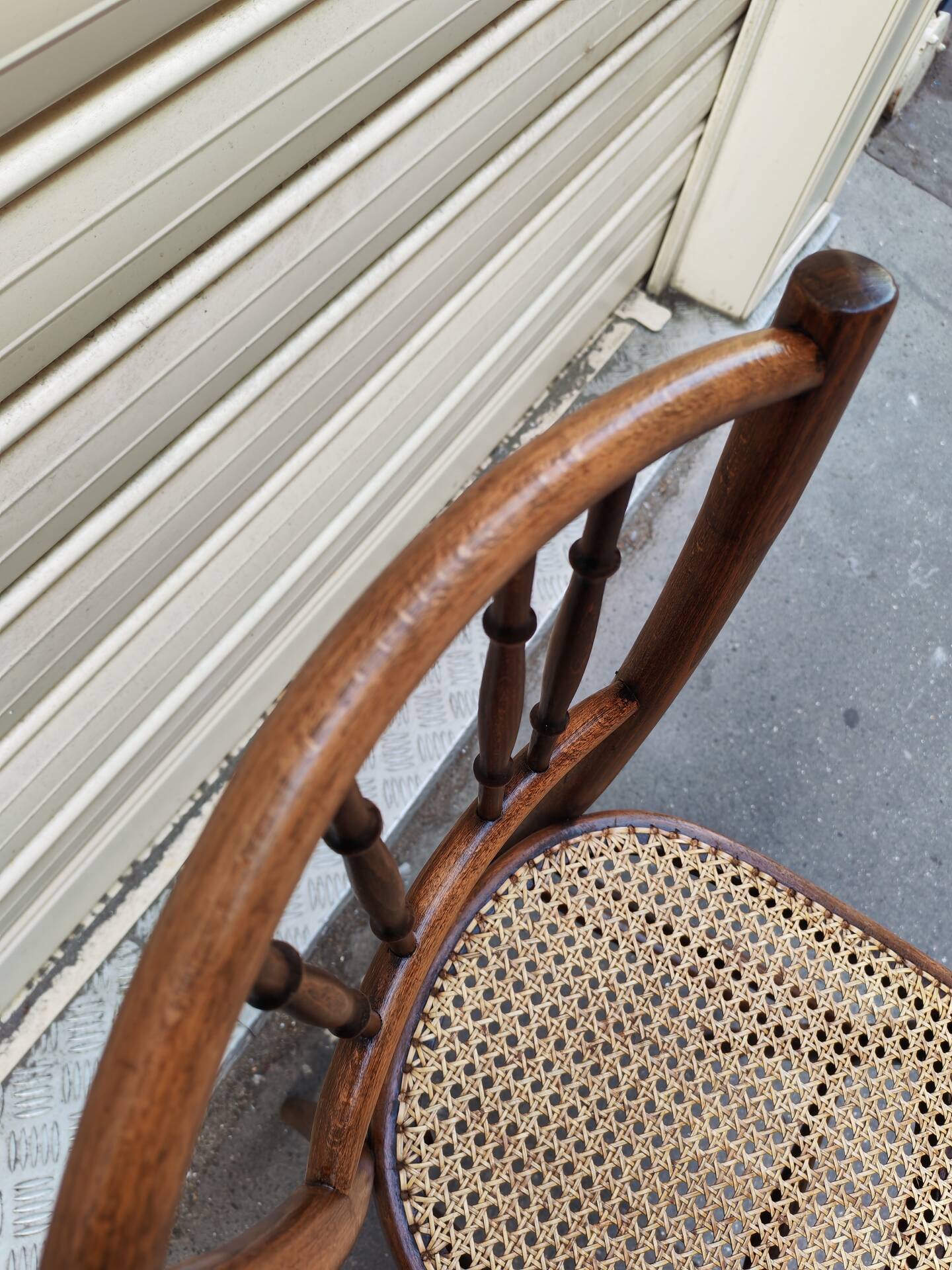 Bistro chair in wood and caning from the 1900s.