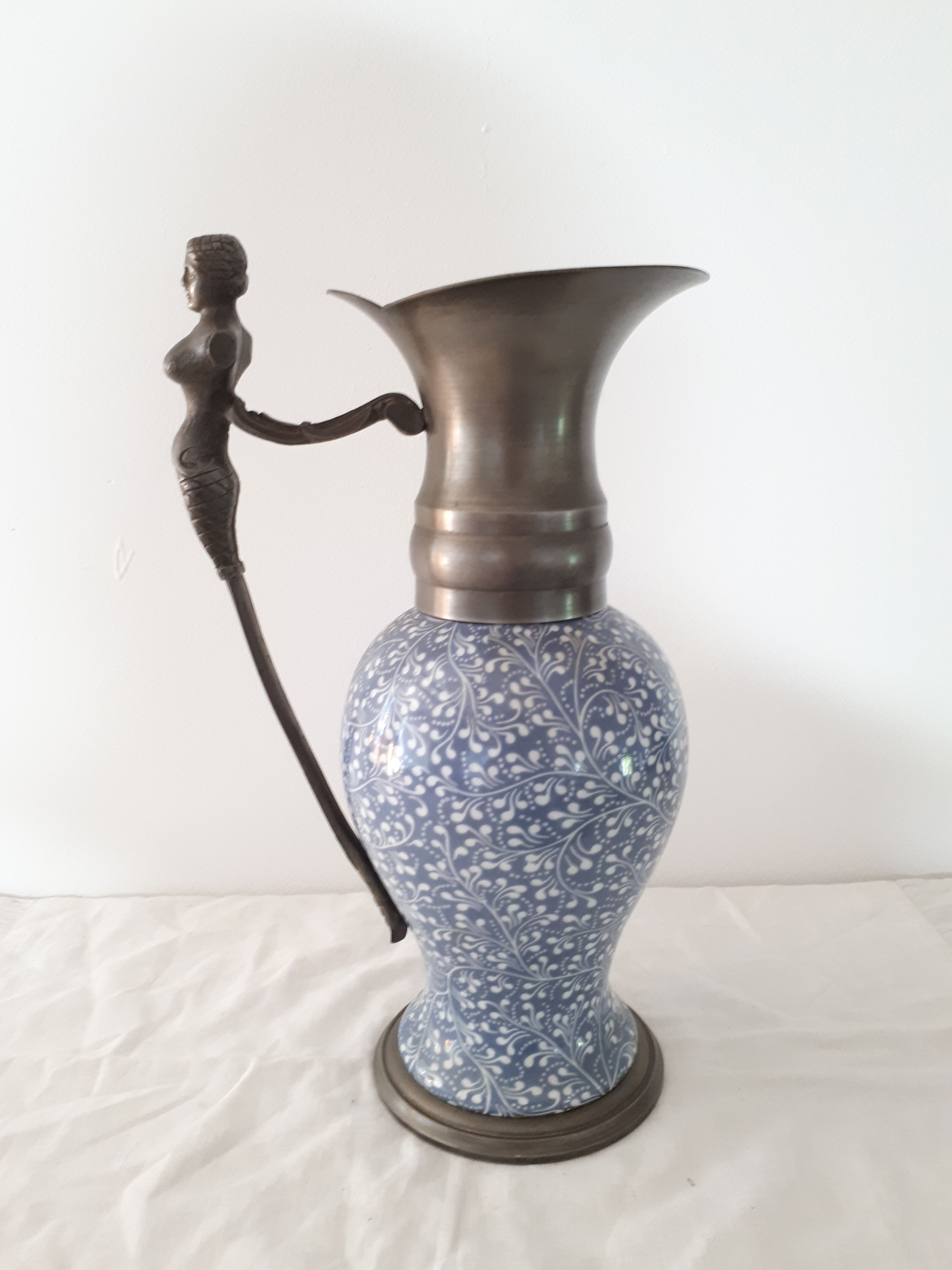 Earthenware and pewter ewer with mermaid handle