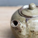 Artisanal teapot in glazed sandstone