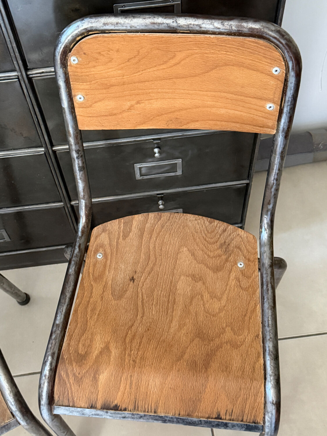 Pair of vintage adult school chairs in patinated metal