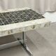 Vintage coffee table in chromed metal and ceramic
