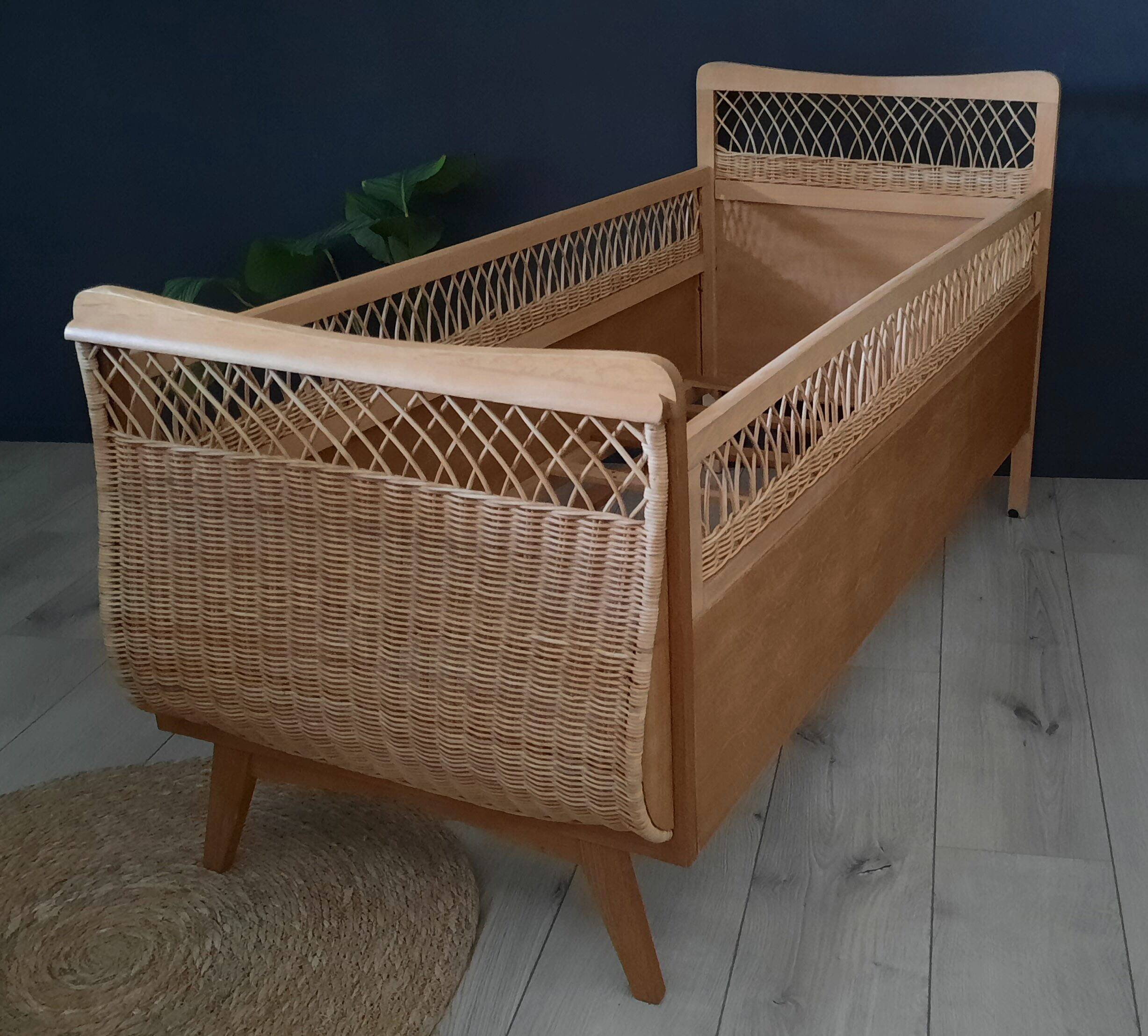 Restored vintage wooden and rattan basket baby bed