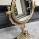 Large round psyche/tilting table mirror, louis xvi/baroque style, in polished patinated brass. 35 x 22 cm