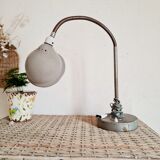 Antique articulated metal workshop lamp