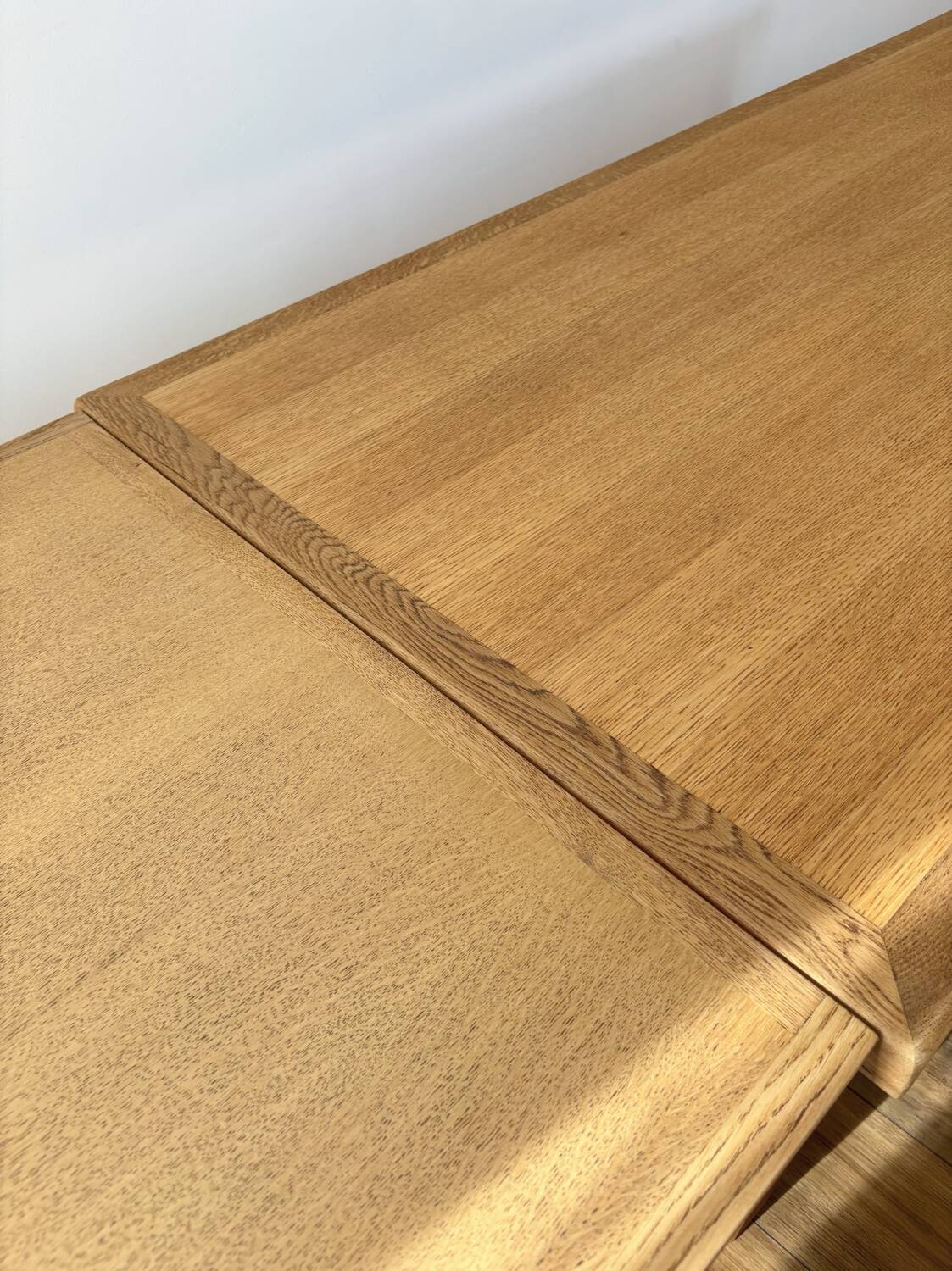 Solid oak farmhouse table with extensions.