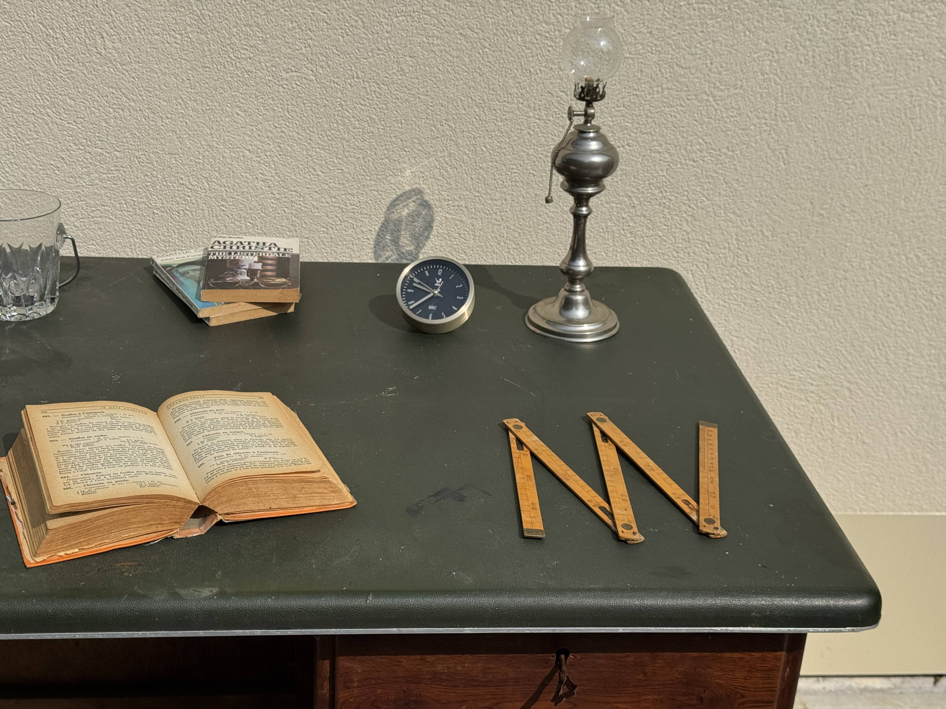 Modernist desk in wood and green moleskin upholstery