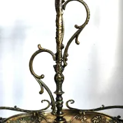 Italian brass umbrella stand, Art Nouveau style, with putti.