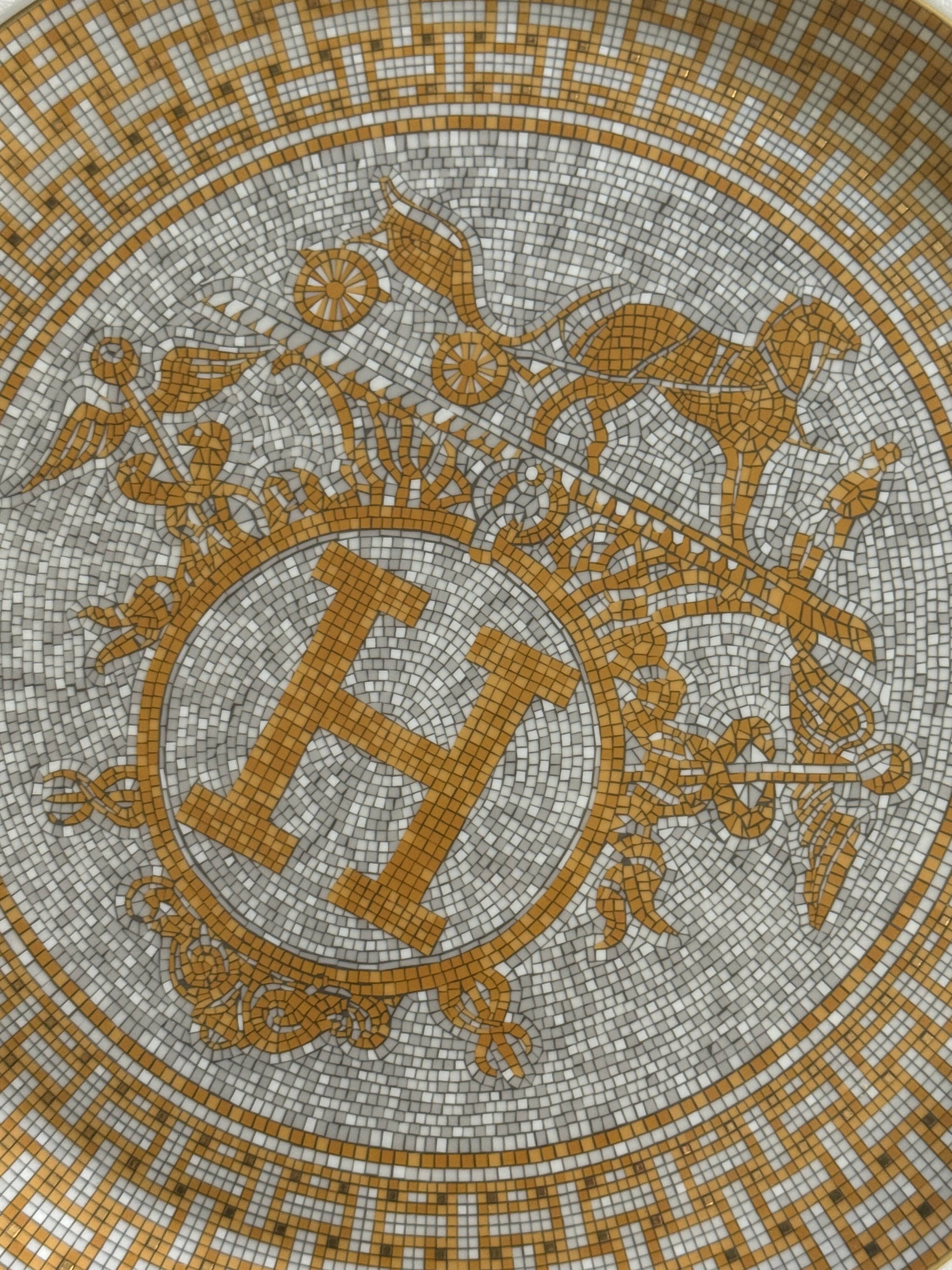 Mosaic tart dish in 24-carat gold by Hermès