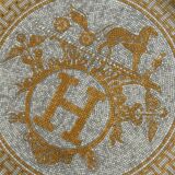 Mosaic tart dish in 24-carat gold by Hermès