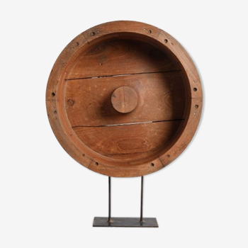 Wooden wheel mold on stand