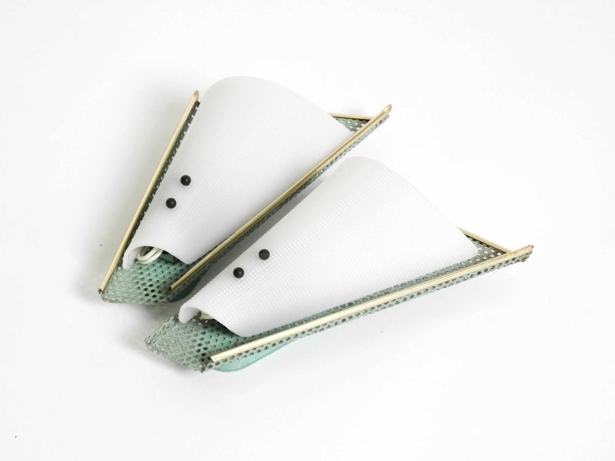 Pair of beautiful mint green Mid Century Modern perforated sheet metal wall